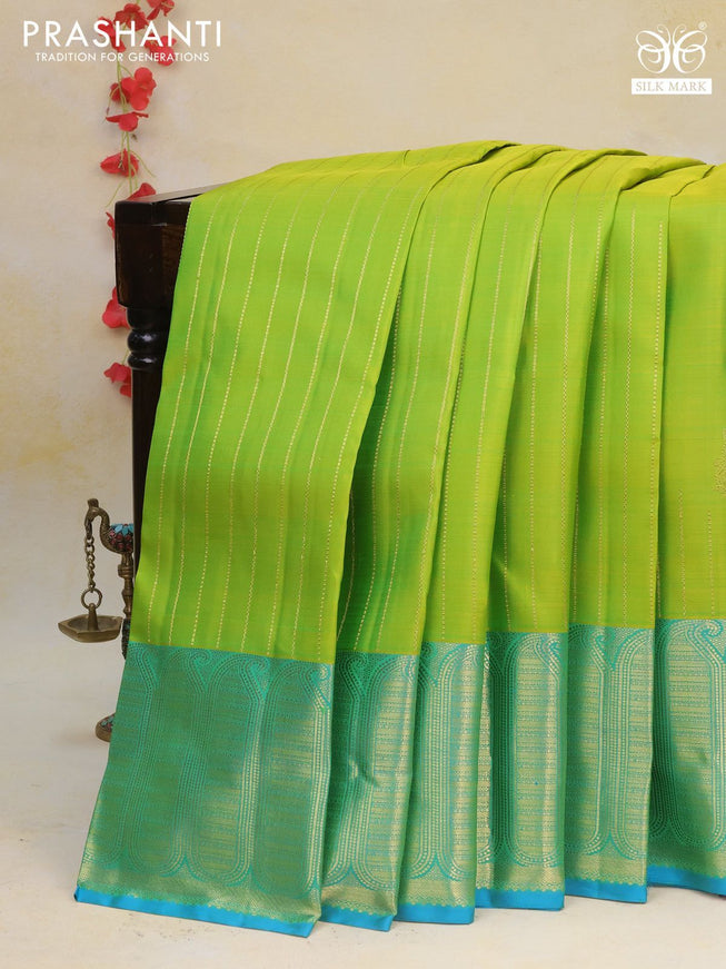 Pure kanchipuram silk saree lime green and light blue with allover zari weaves and zari woven border