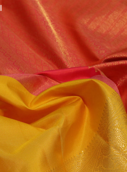 Pure kanchipuram silk saree mango yellow and dual shade of pinkish orange with plain body and long rich zari woven korvai border