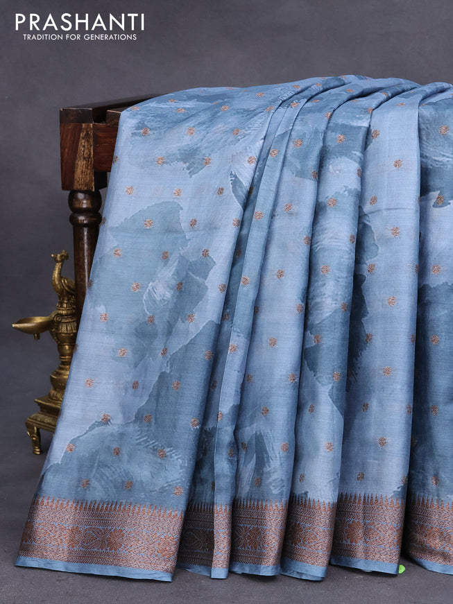 Banarasi tussar silk saree greyish blue with allover prints & thread zari buttas and woven border