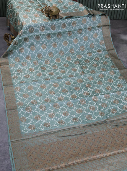 Banarasi tussar silk saree pastel green with allover batik prints & thread zari buttas and woven border