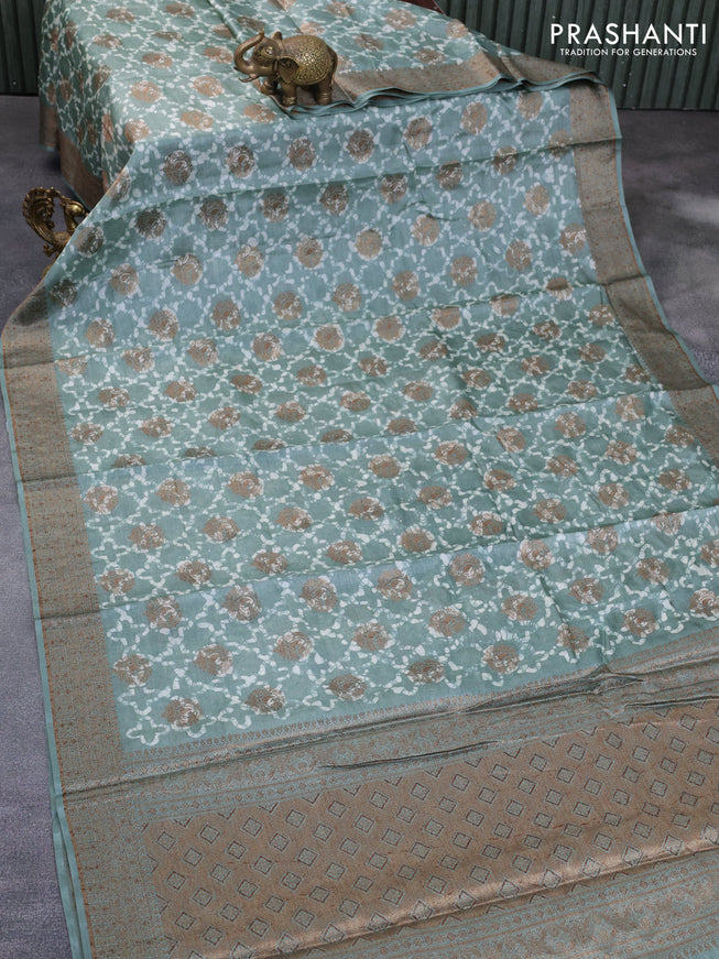 Banarasi tussar silk saree pastel green with allover batik prints & thread zari buttas and woven border