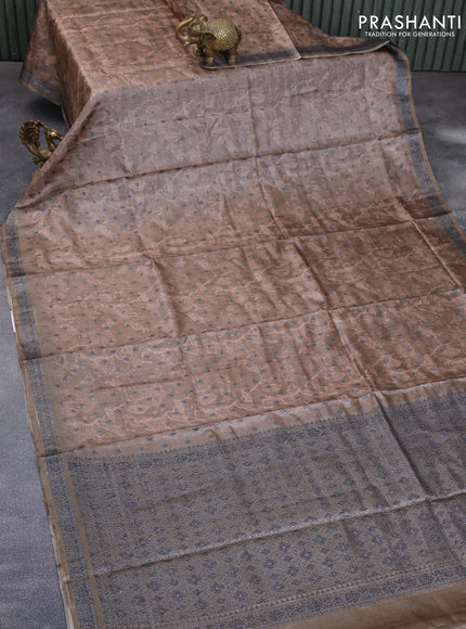 Banarasi tussar silk saree brown shade with allover prints & zari buttas and woven border