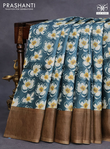 Pure tussar silk saree peacock green and chikku shade with allover floral prints and zari woven border