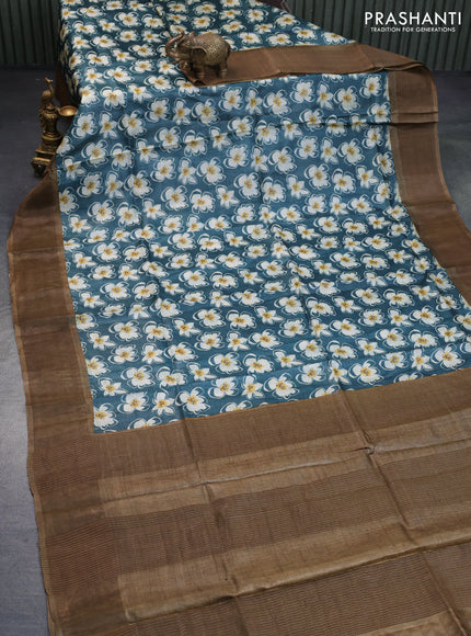 Pure tussar silk saree peacock green and chikku shade with allover floral prints and zari woven border