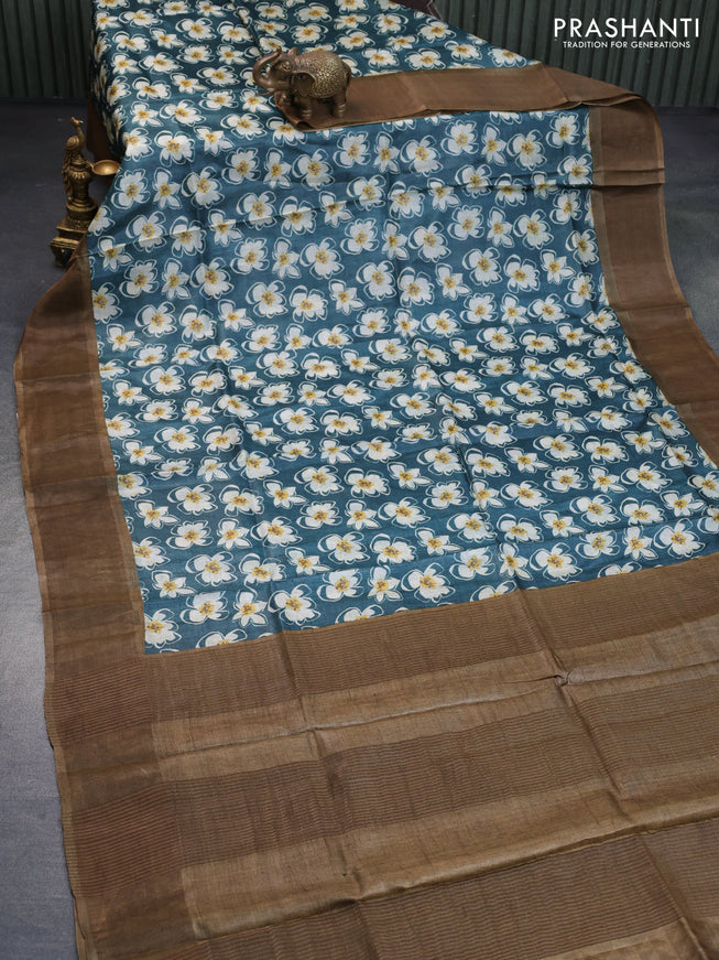 Pure tussar silk saree peacock green and chikku shade with allover floral prints and zari woven border