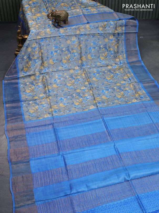 Pure tussar silk saree grey and cs blue with allover prints and zari woven border