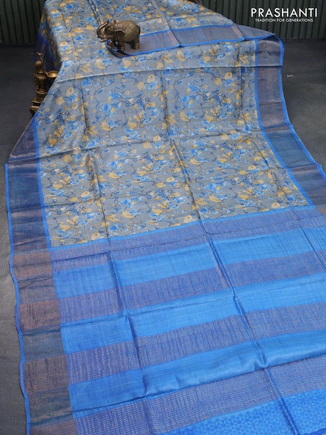 Pure tussar silk saree grey and cs blue with allover prints and zari woven border