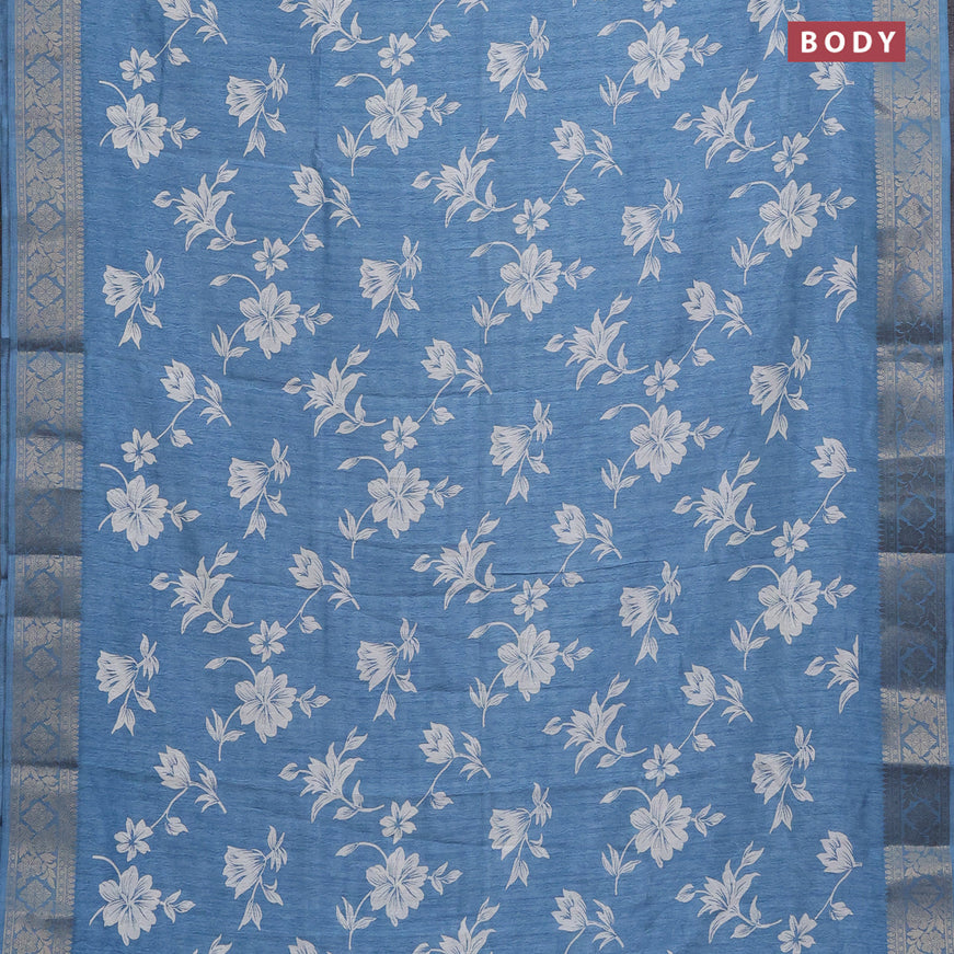 Semi dola saree blue shade with allover floral prints & self emboss and zari woven border