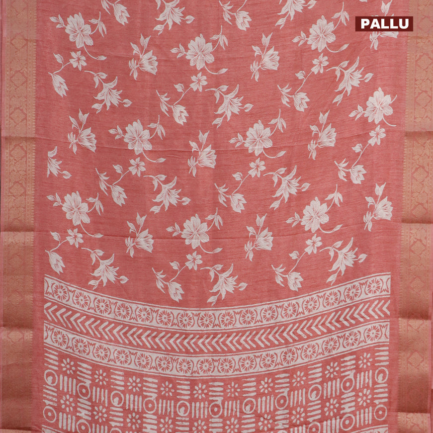 Semi dola saree peach shade with allover floral prints & self emboss and zari woven border