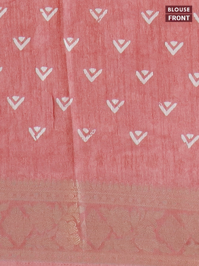 Semi dola saree peach shade with allover floral prints & self emboss and zari woven border