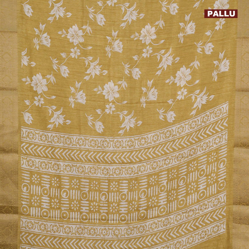 Semi dola saree yellow with allover floral prints & self emboss and zari woven border