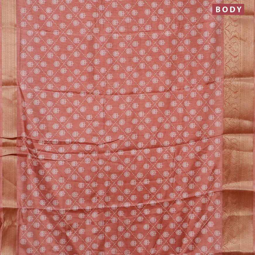 Semi dola saree peach shade with allover floral prints and zari woven border