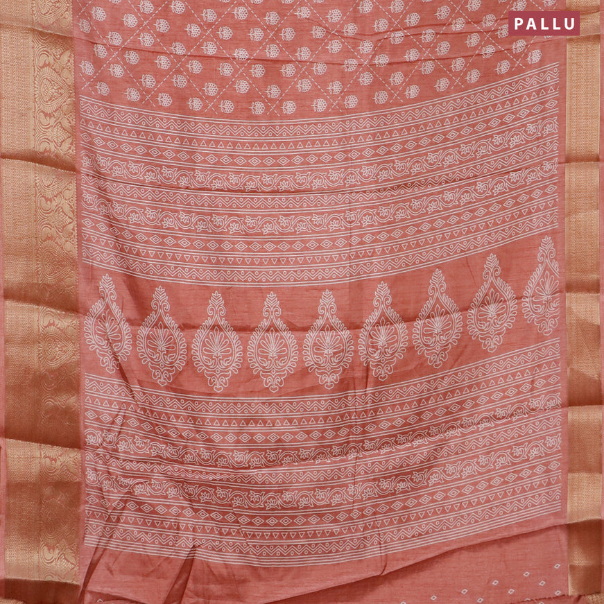 Semi dola saree peach shade with allover floral prints and zari woven border