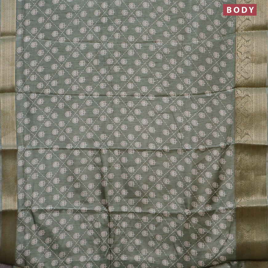 Semi dola saree pastel green with allover floral prints and zari woven border