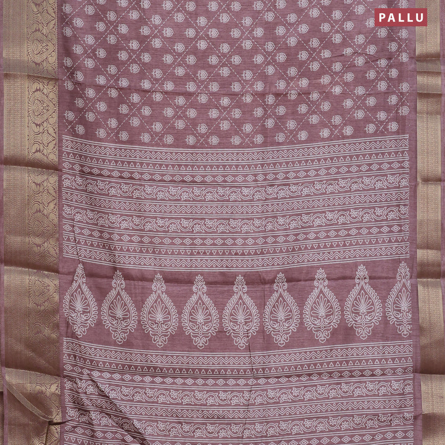 Semi dola saree pastel brown shade with allover floral prints and zari woven border