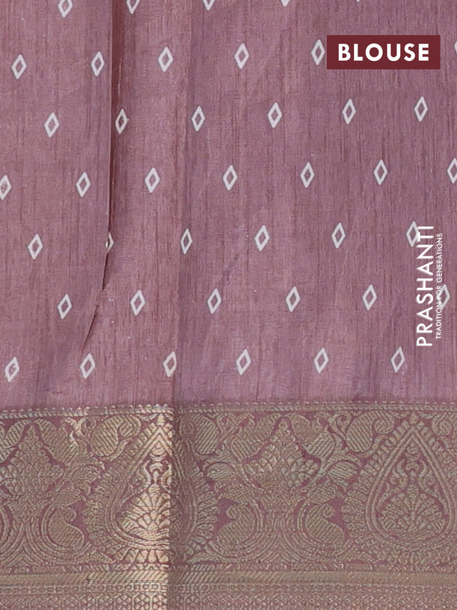 Semi dola saree pastel brown shade with allover floral prints and zari woven border