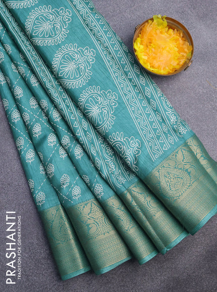 Semi dola saree teal green with allover floral prints and zari woven border