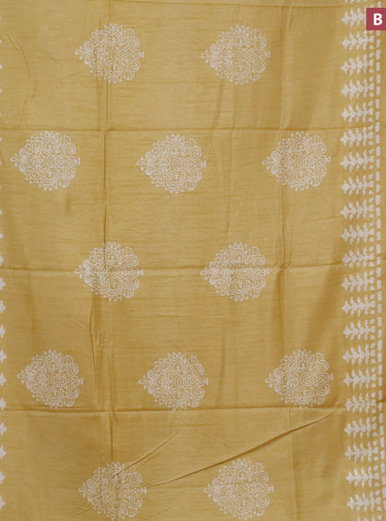 Semi dola saree yellow with butta prints and zari woven border