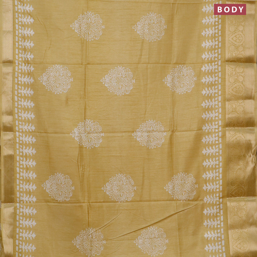 Semi dola saree yellow with butta prints and zari woven border