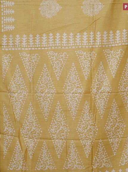 Semi dola saree yellow with butta prints and zari woven border