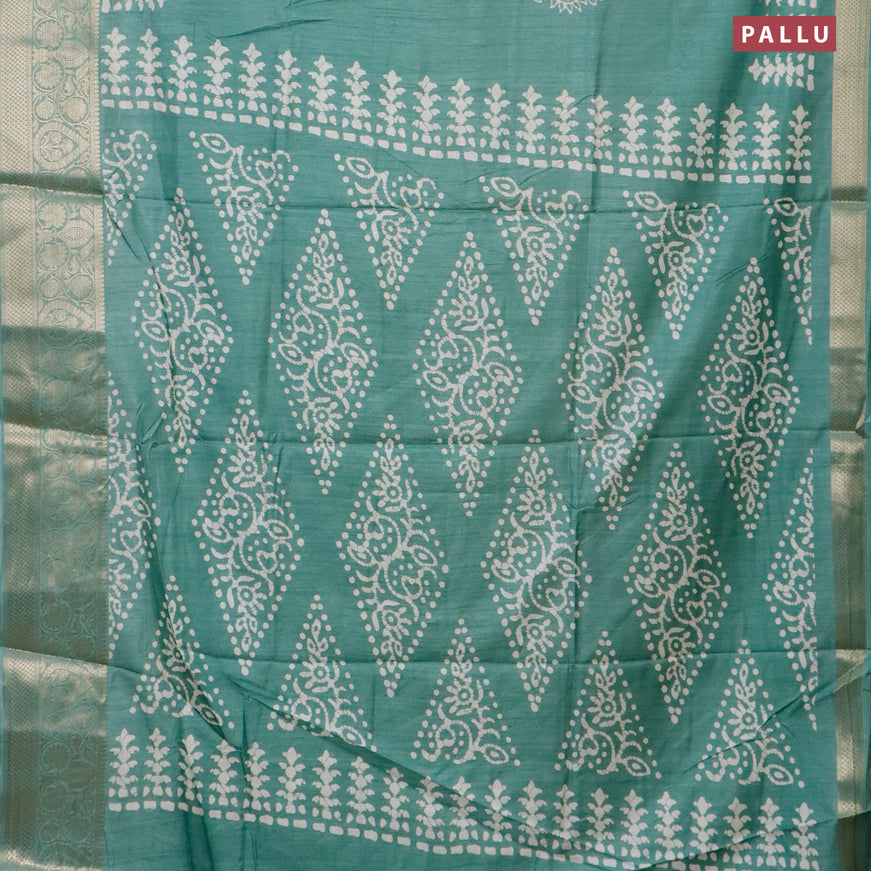 Semi dola saree pastel green with butta prints and zari woven border