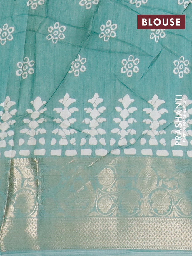 Semi dola saree pastel green with butta prints and zari woven border