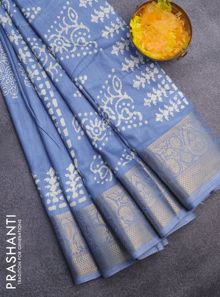 Semi dola saree blue shade with butta prints and zari woven border