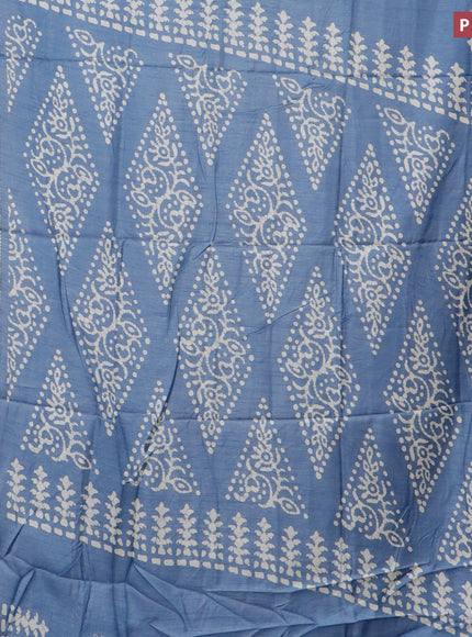 Semi dola saree blue shade with butta prints and zari woven border