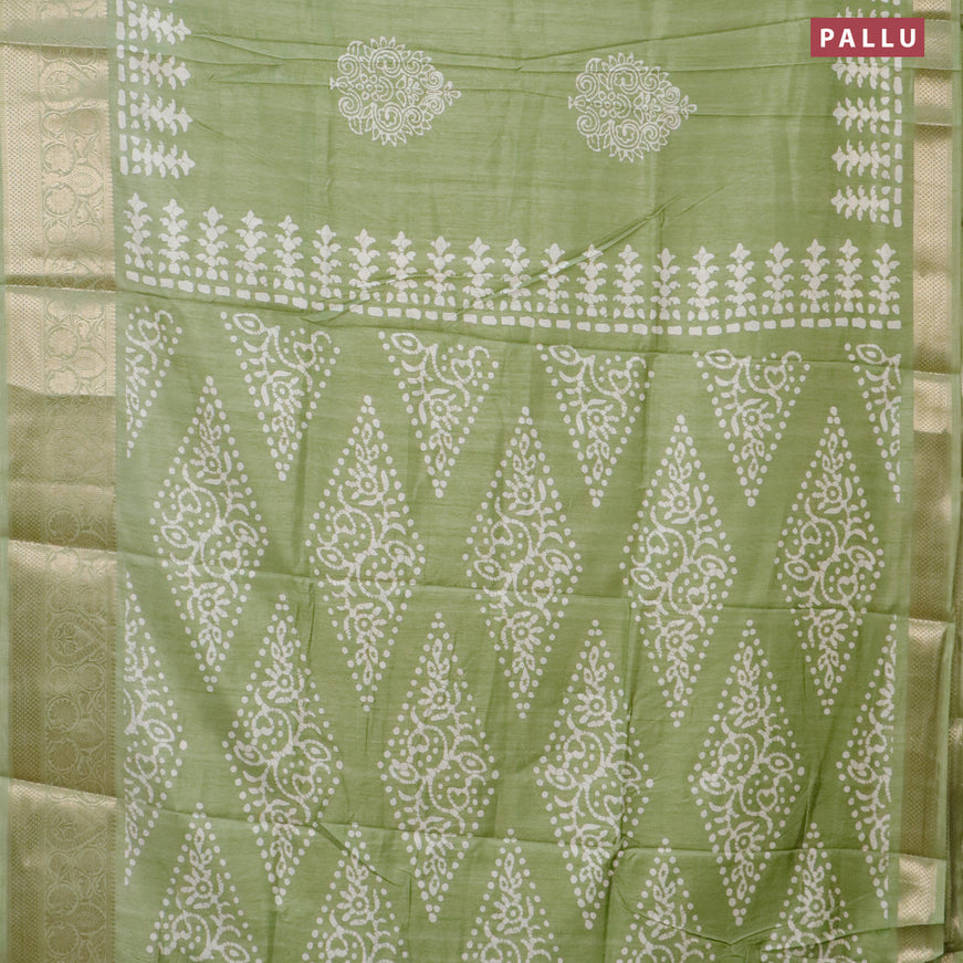 Semi dola saree green shade with butta prints and zari woven border