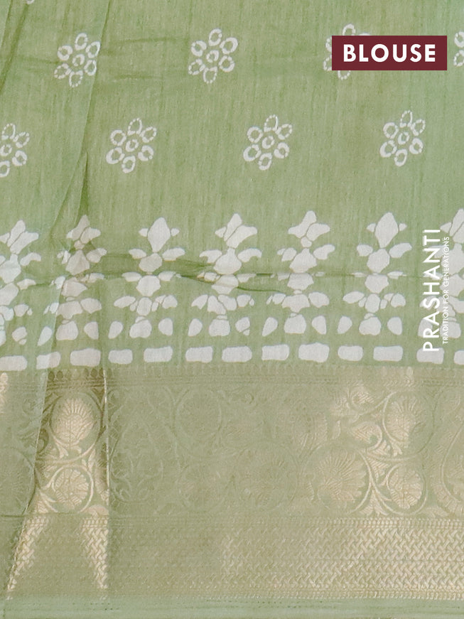 Semi dola saree green shade with butta prints and zari woven border