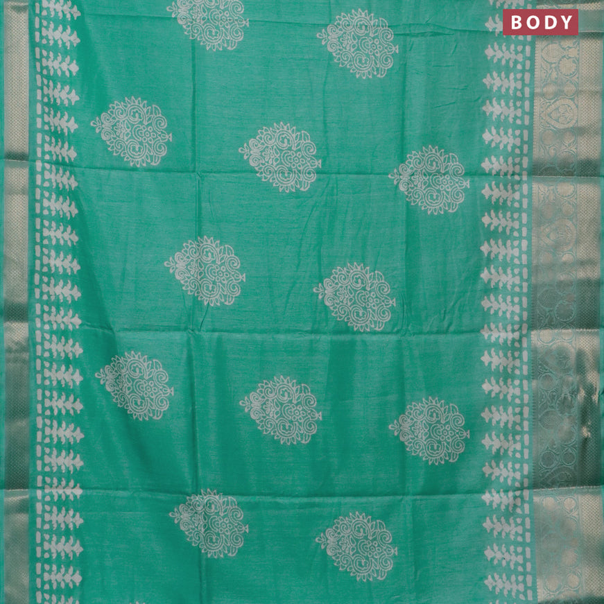 Semi dola saree teal blue shade with butta prints and zari woven border