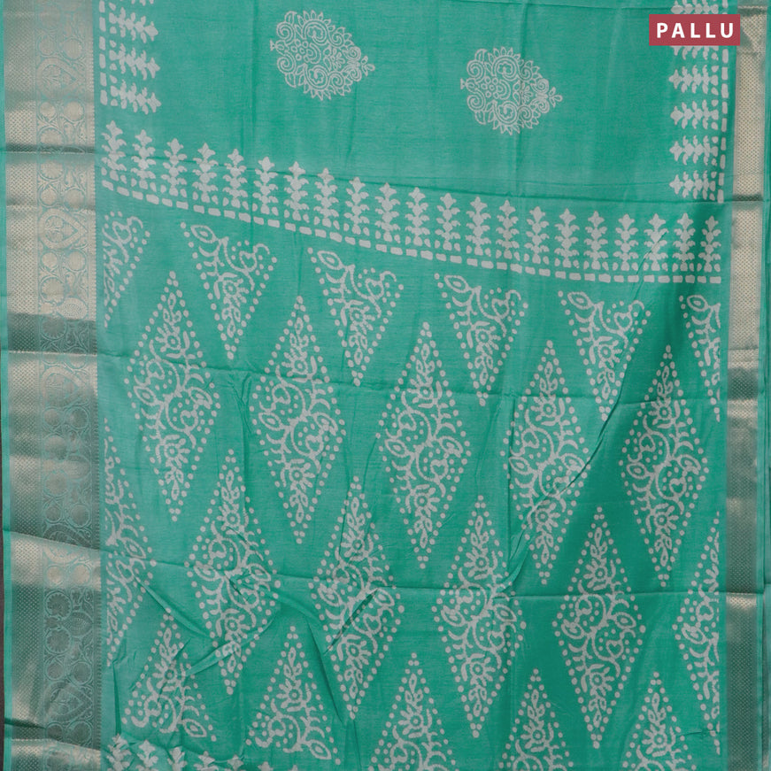 Semi dola saree teal blue shade with butta prints and zari woven border