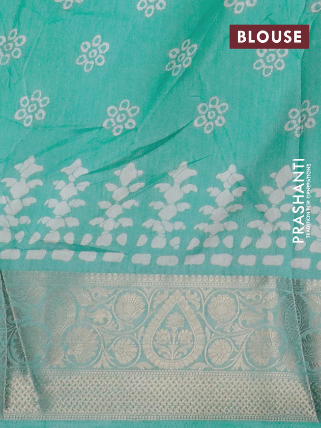 Semi dola saree teal blue shade with butta prints and zari woven border