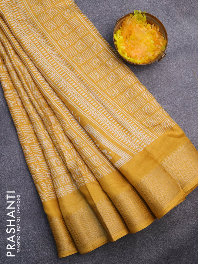 Semi dola saree yellow with allover geometric prints and zari woven border