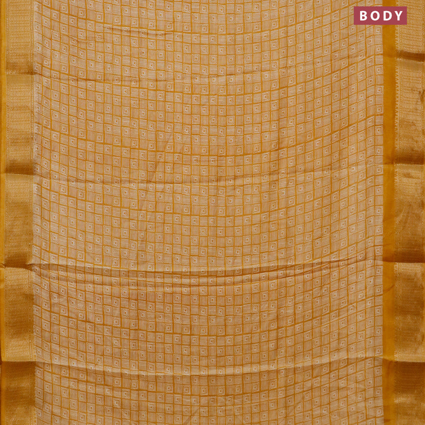 Semi dola saree yellow with allover geometric prints and zari woven border