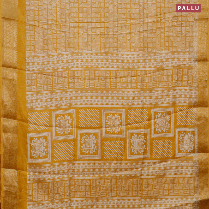 Semi dola saree yellow with allover geometric prints and zari woven border