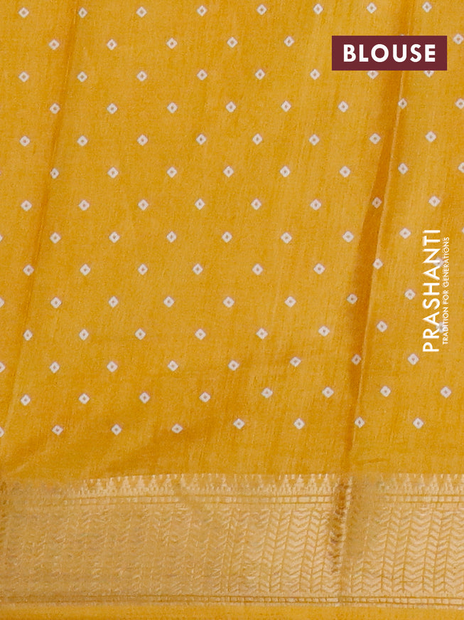 Semi dola saree yellow with allover geometric prints and zari woven border