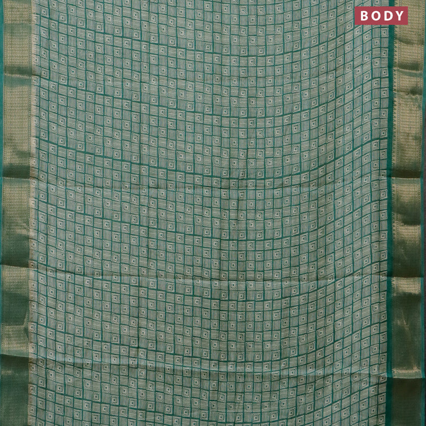 Semi dola saree green with allover geometric prints and zari woven border