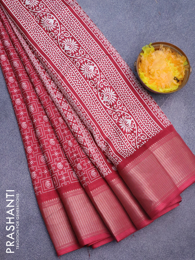 Semi dola saree maroon with allover prints and zari woven border