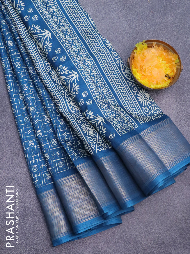 Semi dola saree peacock blue with allover prints and zari woven border