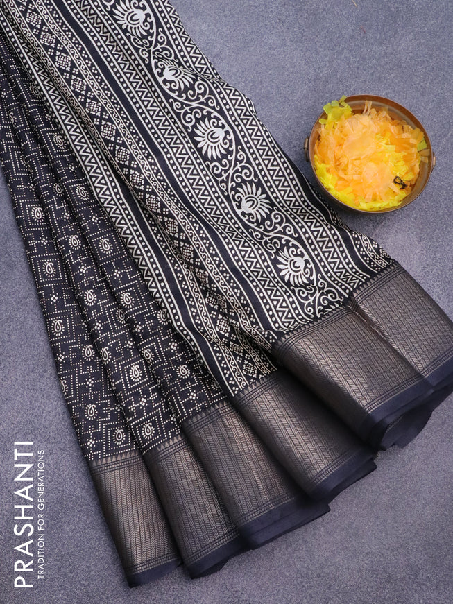 Semi dola saree black with allover prints and zari woven border