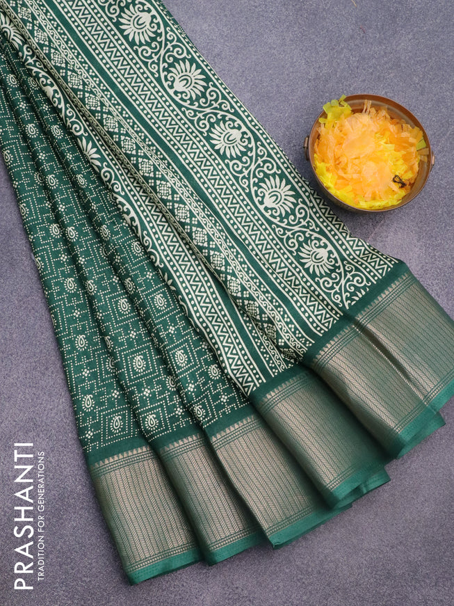 Semi dola saree green with allover prints and zari woven border