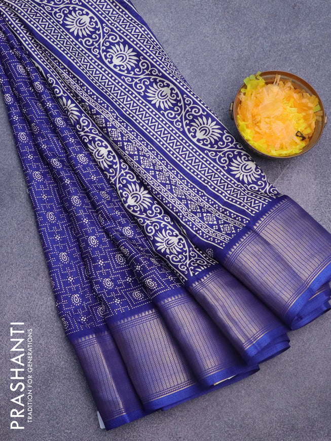 Semi dola saree blue with allover prints and zari woven border