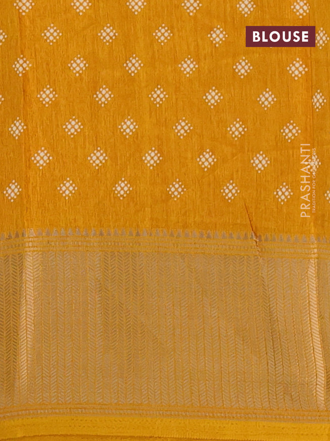 Semi dola saree mustard yellow with allover prints and zari woven border