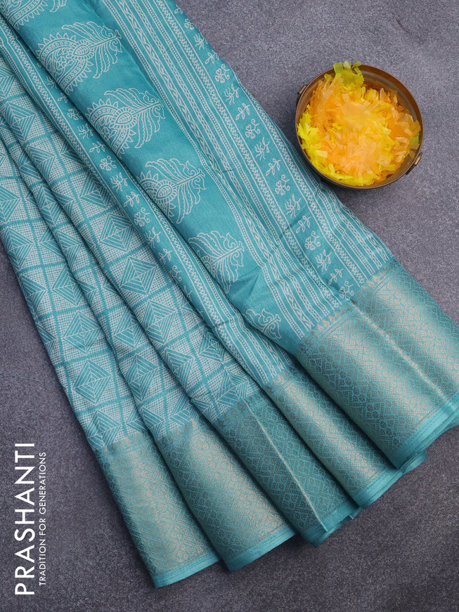 Semi dola saree teal blue with allover geometric prints and zari woven border