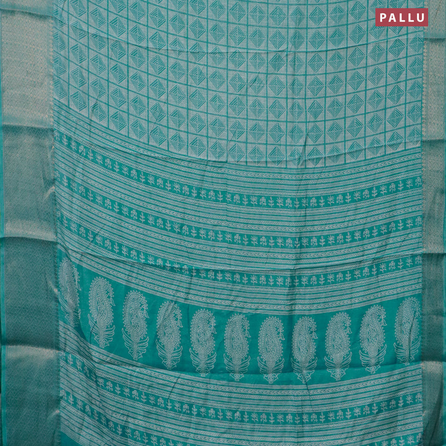 Semi dola saree teal blue with allover geometric prints and zari woven border