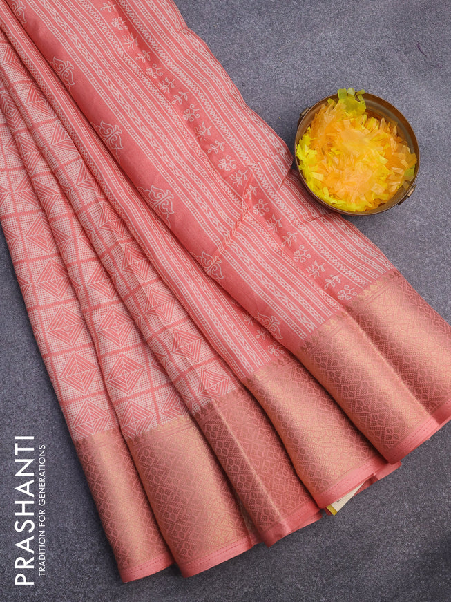 Semi dola saree peach shade with allover geometric prints and zari woven border