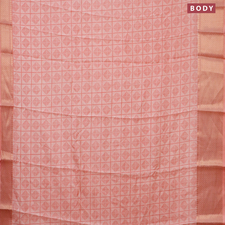 Semi dola saree peach shade with allover geometric prints and zari woven border