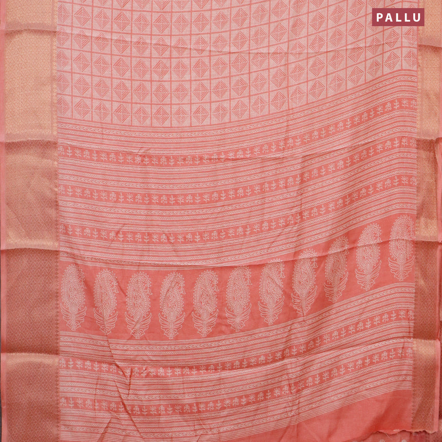 Semi dola saree peach shade with allover geometric prints and zari woven border