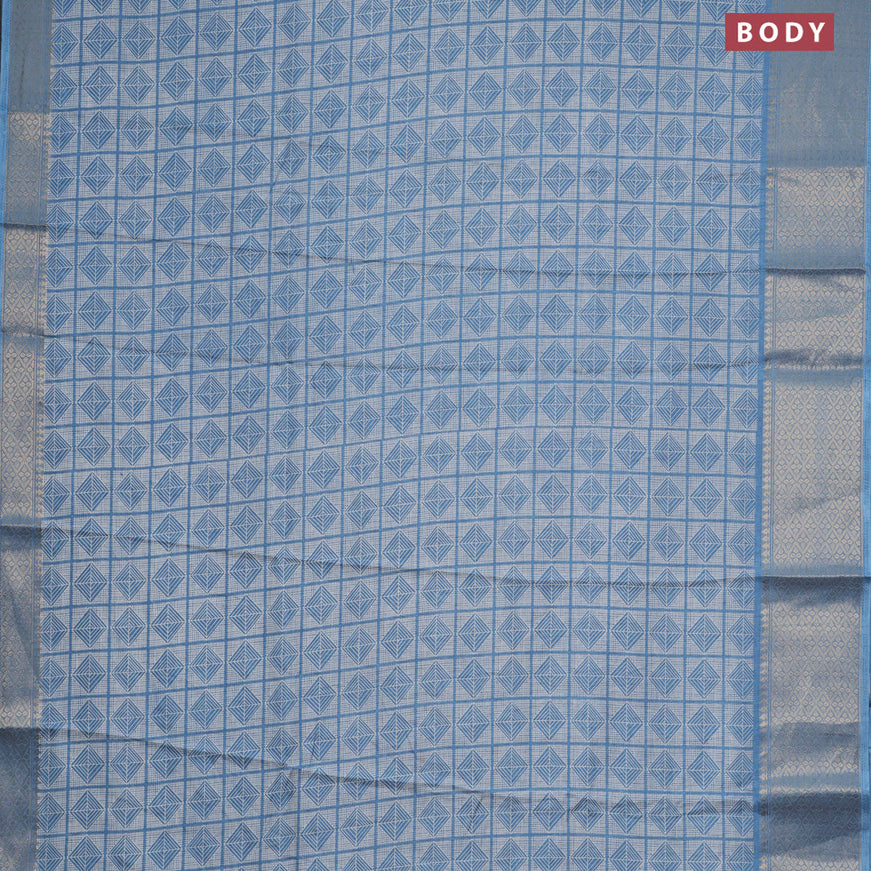 Semi dola saree blue shade with allover geometric prints and zari woven border